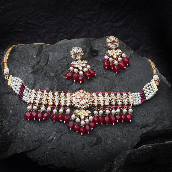 Kundan and Polki Choker set with Red & White beads.