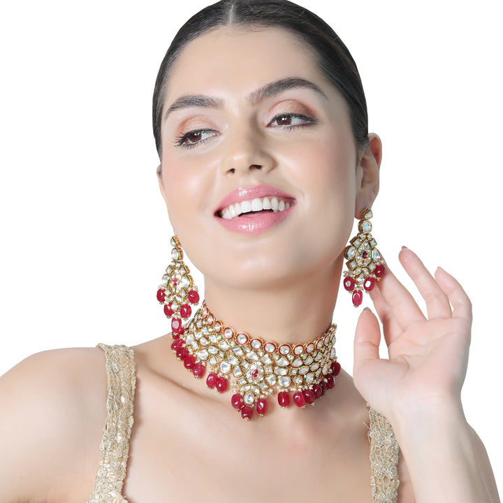 Gold finished Kundan and Polki Choker set with matching Danglers.