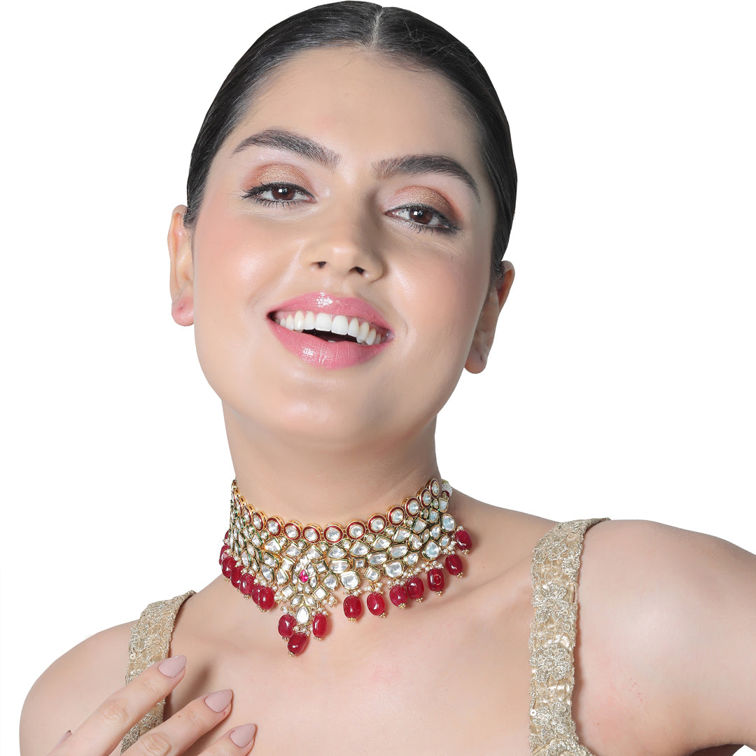 Gold finished Kundan and Polki Choker set with matching Danglers.