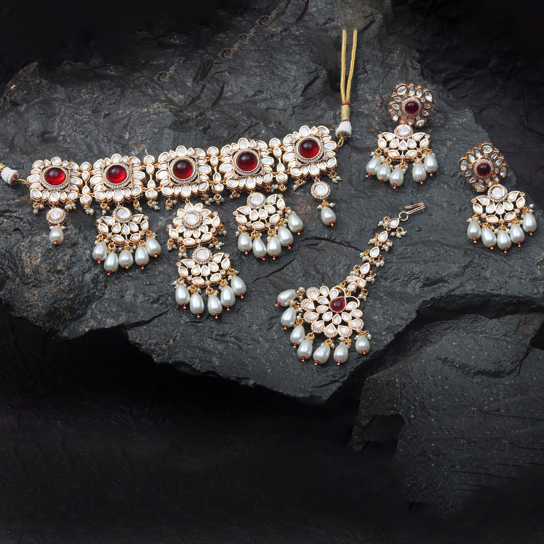 Gold finished Kundan Polki Choker set with matching Danglers and Mang Tikka