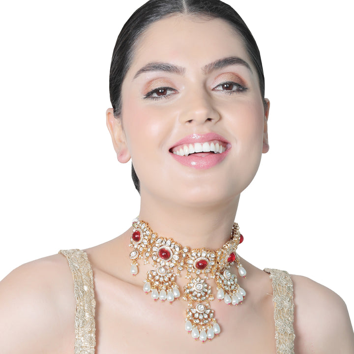 Gold finished Kundan Polki Choker set with matching Danglers and Mang Tikka