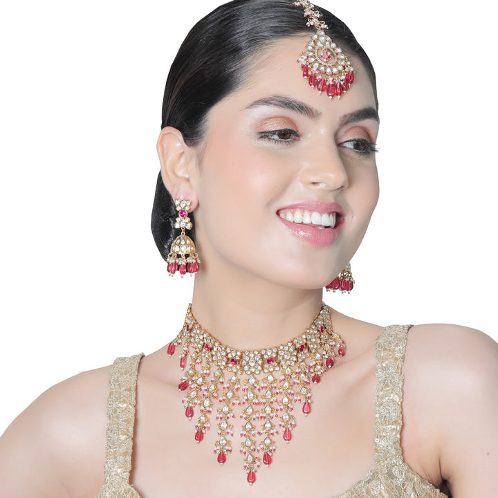 Gold finished Kundan and Polki cascading Choker set with deep Rani beads