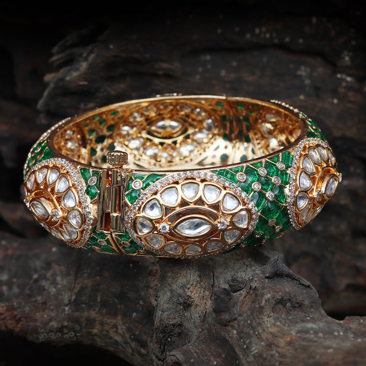 Gold finished Kundan Polki Kada with intricate green Meenakari work.