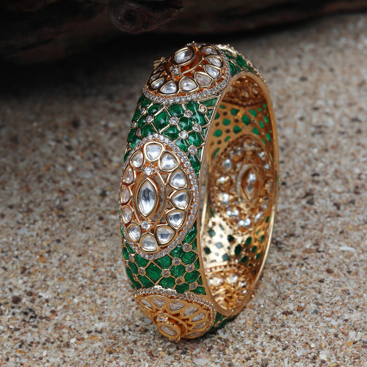 Gold finished Kundan Polki Kada with intricate green Meenakari work.