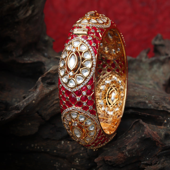 Gold finished Kundan Polki Kada with Intricate Red Meenakari work.