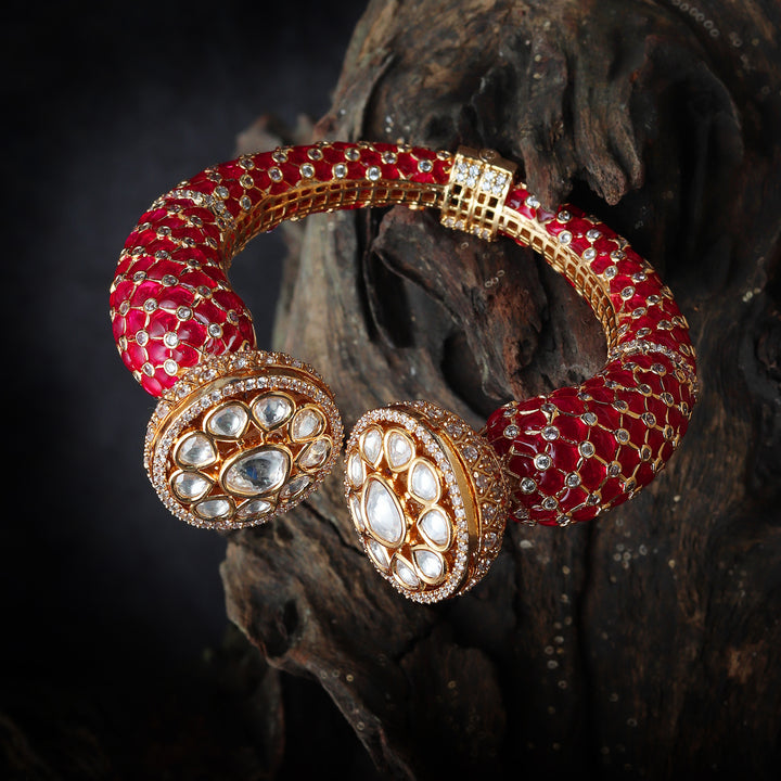 Gold finished Red Meenakari Kada with Kundan Polki & Delicate Cubic Zirconia Detailing.