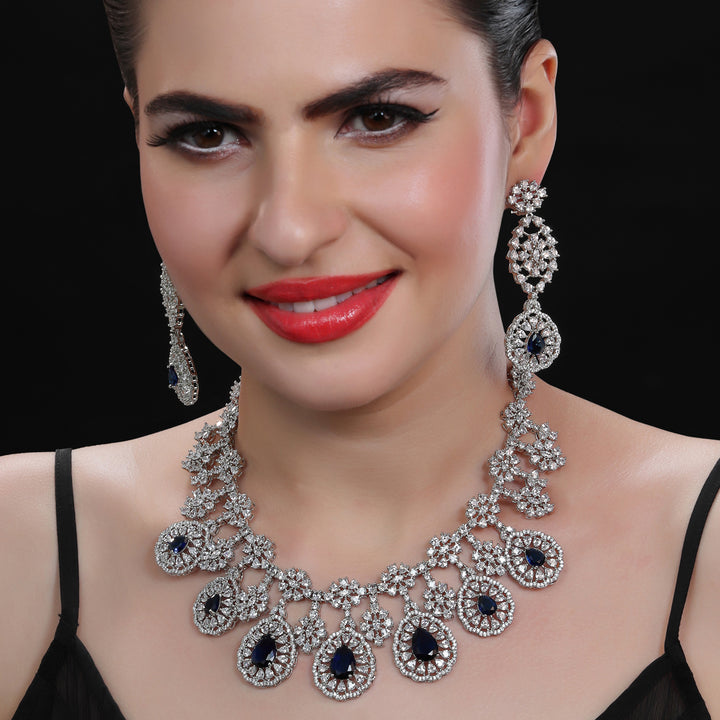 Rodium Plated Cubic Zirconia Drop Necklace Set with Blue Sapphire Stones